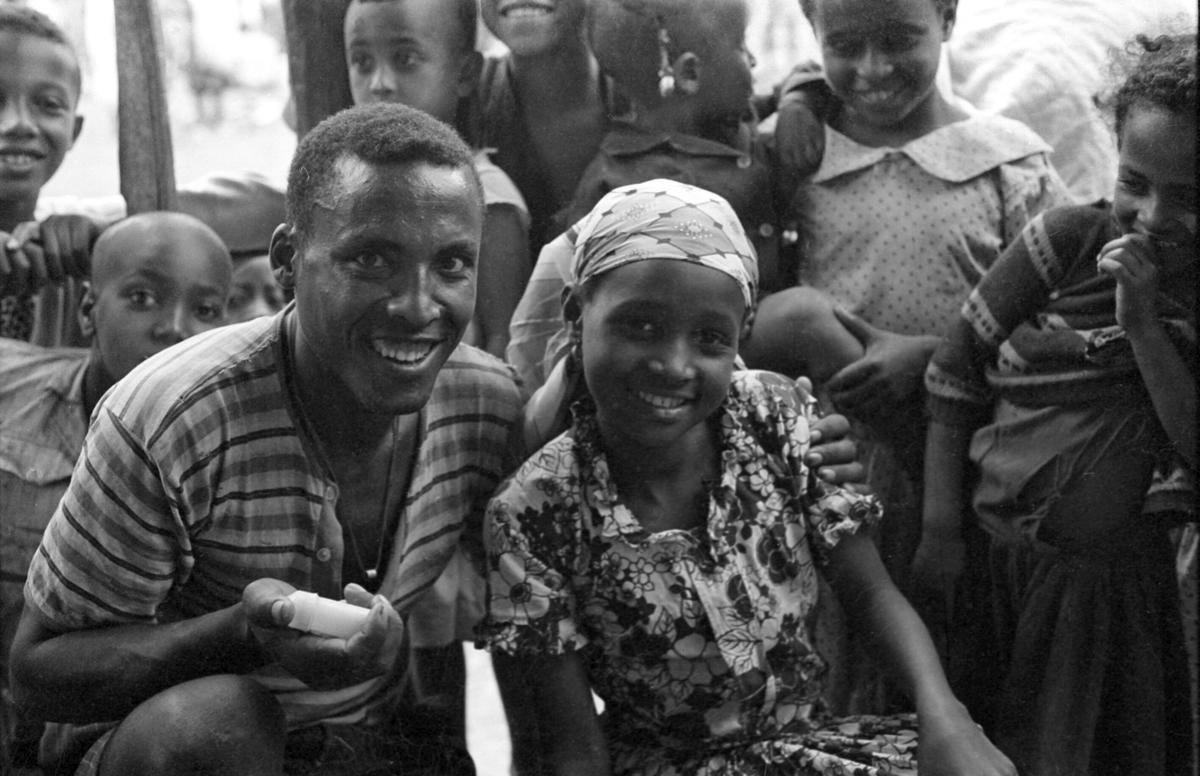 Biforcated needle holder