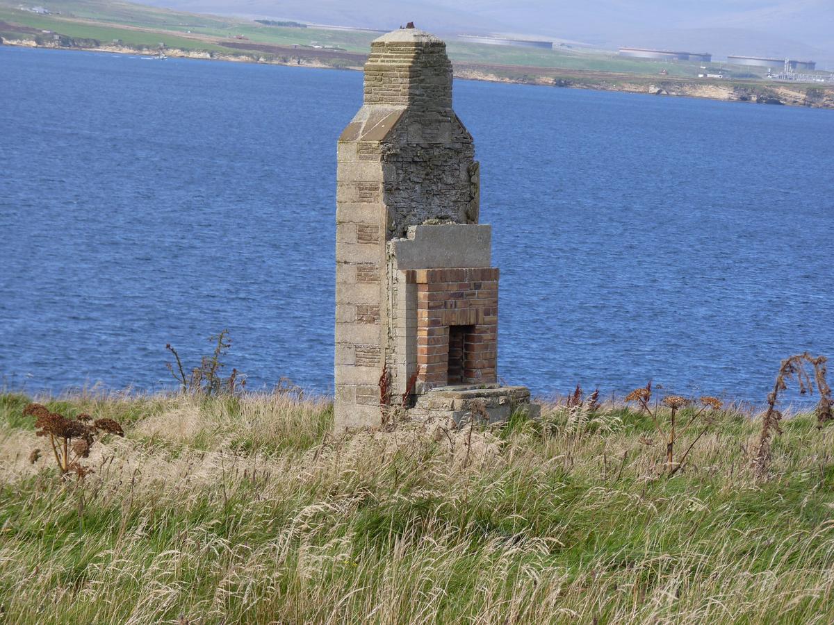 <p>Fireplace for a WW2 hut long removed at Hoxa Head battery</p>
