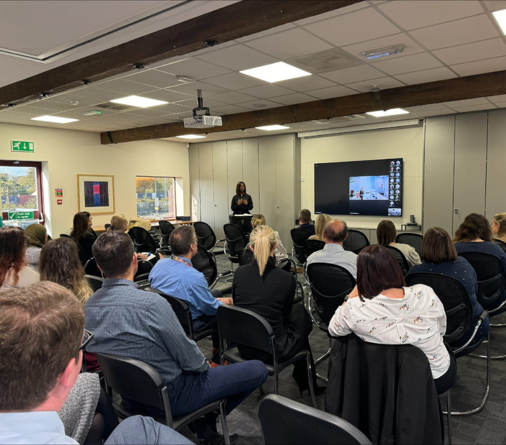 Pauline speaking in Buckles Solicitors in Peterborough about Black History month and EDI