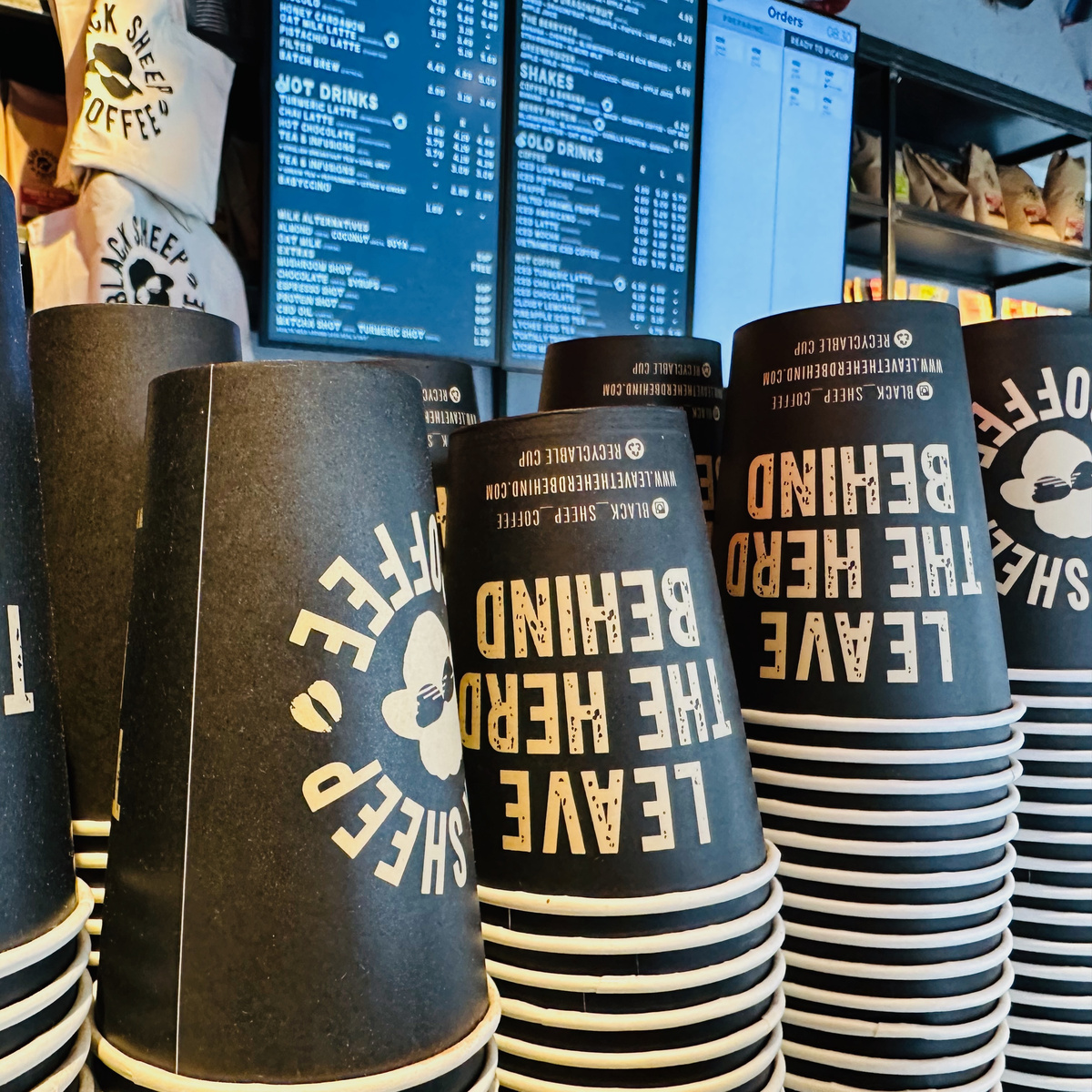 Stacks of takeaway cups in an independent café
