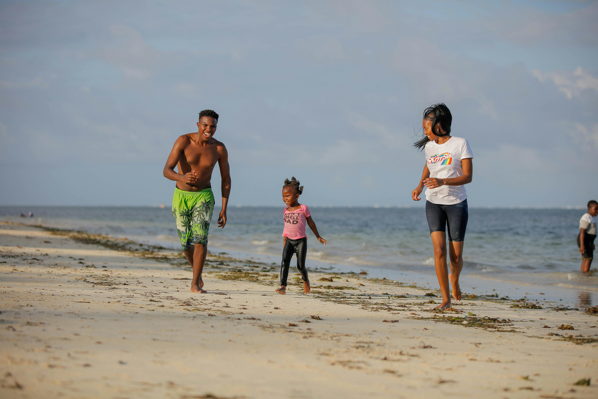 A family spending time together on a beach