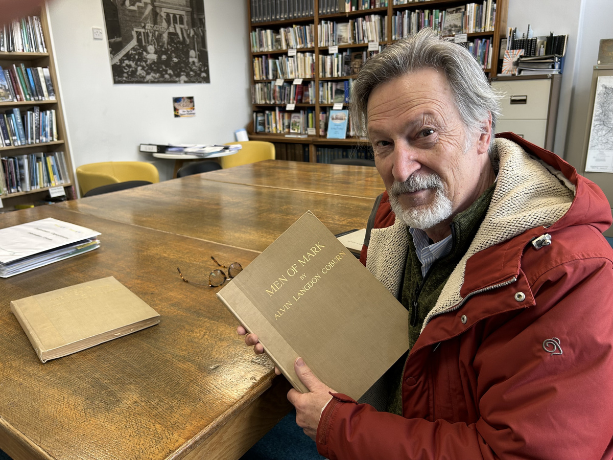 Researching background for “The Eighth Image” at the library in Colwyn Bay, Wales.