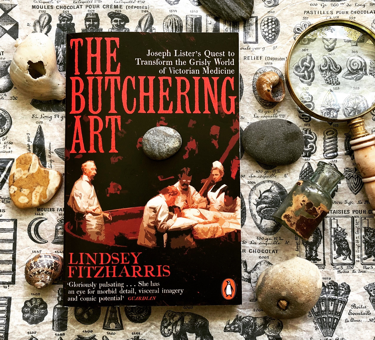 A gothic medical history book arranged with antique curiosities