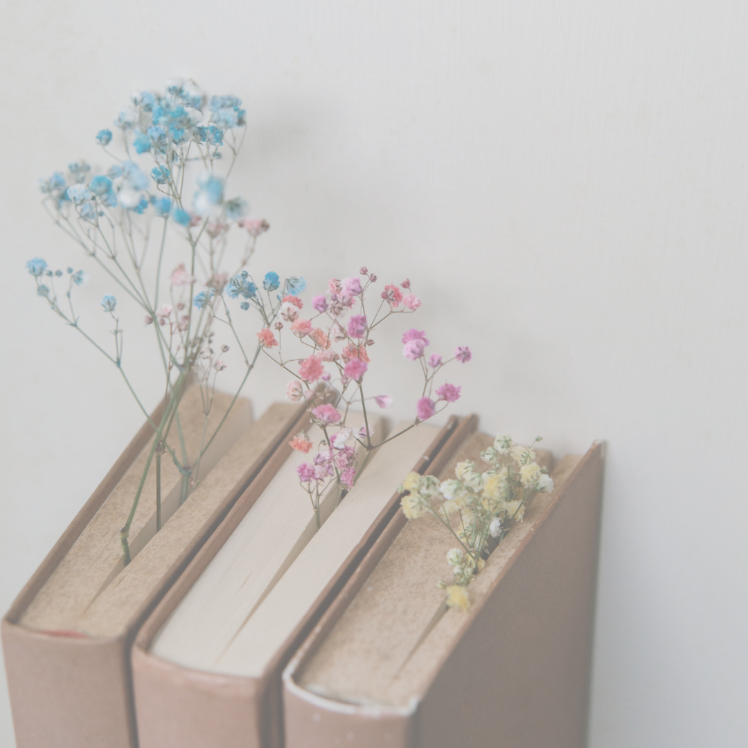 A stack of books with the words cosy up and read