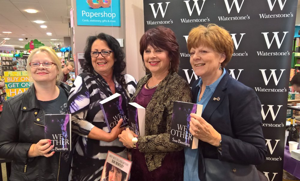 Sue Bentley and readers holding copies of We Other at Waterstones