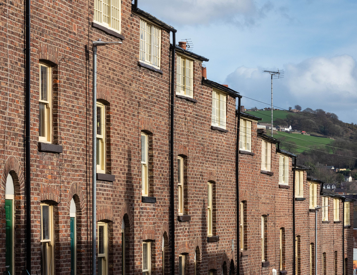 Former weaver's homes in Paradise Street, Macclesfield with their large attic windows providing good light for their work