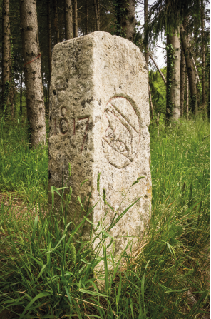 Marker stone 111, placed on the Franco-Swiss&nbsp;border in 1743, its carved sides a witness to&nbsp;the turbulent history of this region and the&nbsp;location of Kilometre Zero