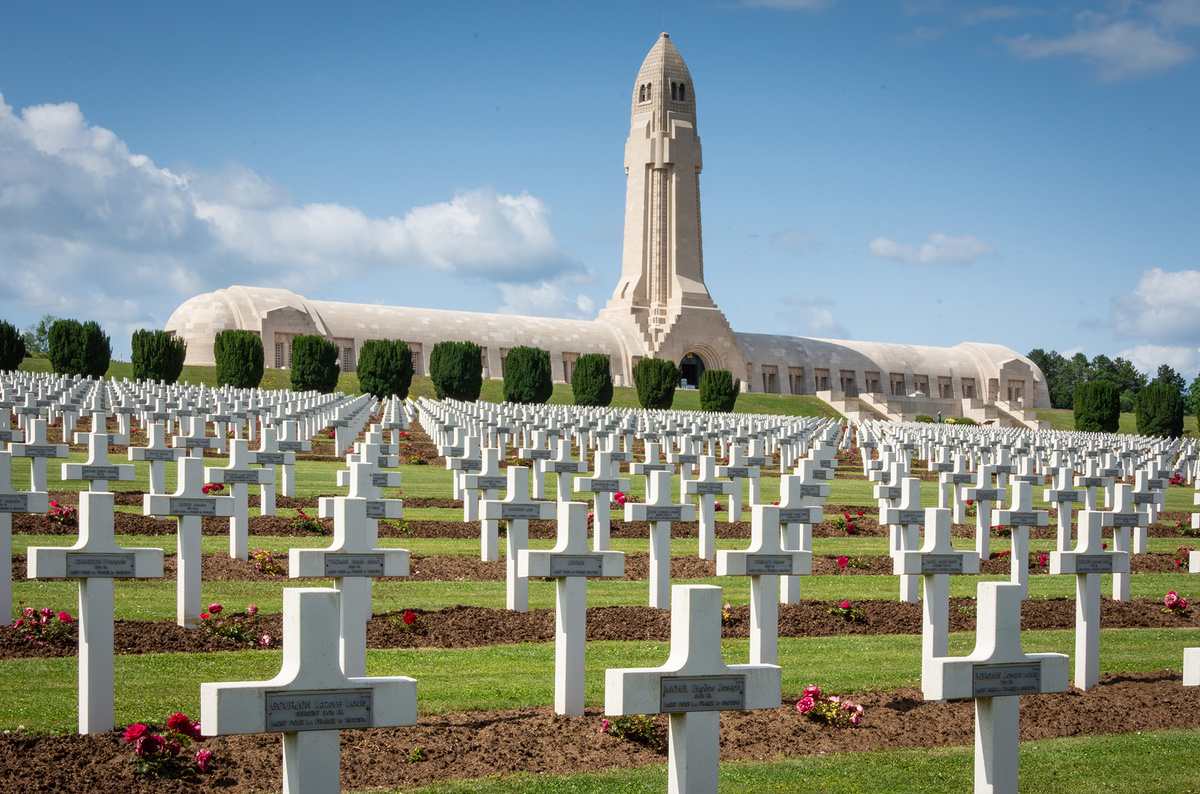 Douaumont cemetery holds the graves of 15,000 French soldiers, while the ossuary (behind) houses the remains of 130,00 French and German soldiers killed during the Battle of Verdun.
