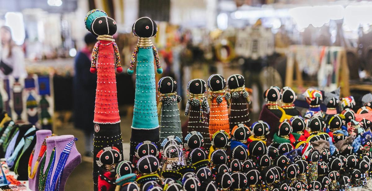 A display of souvenirs and figurines at a market Rosebank Sunday Market in Johannesburg, South Africa. By Vije Vijendranath