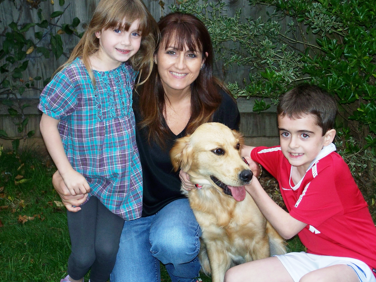 Doreen Connor with her children, Lewis and Julia, and their golden retriever, Skye