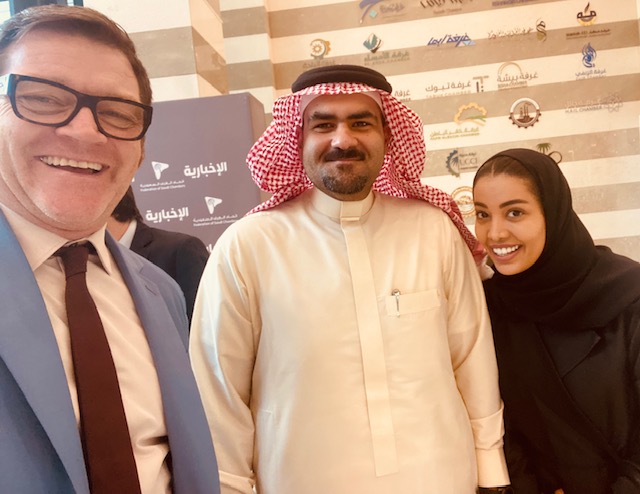 Tom Hadley with delegates at an international business event