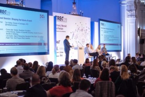 Tom Hadley on stage at a recruitment industry conference