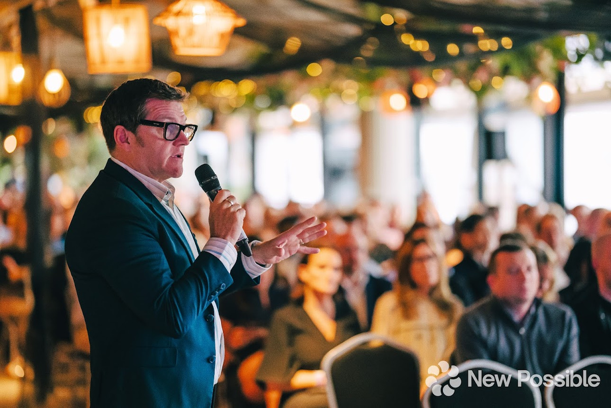 Tom Hadley speaking to an audience during a live session