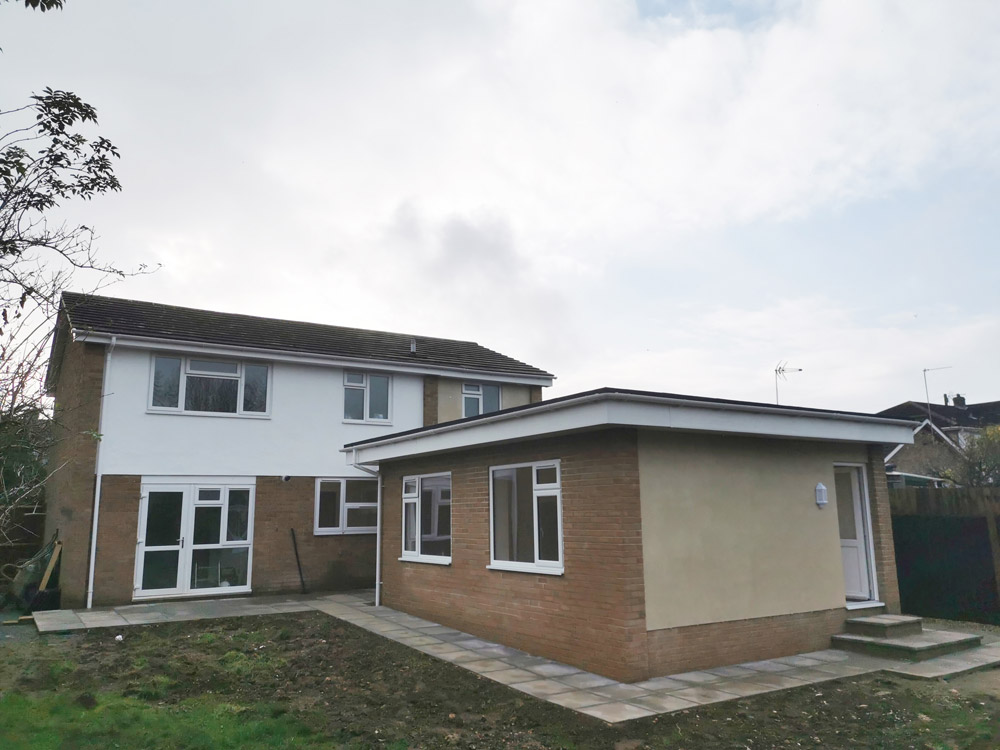 Single-storey rear extension with rendered walls on a semi-detached house