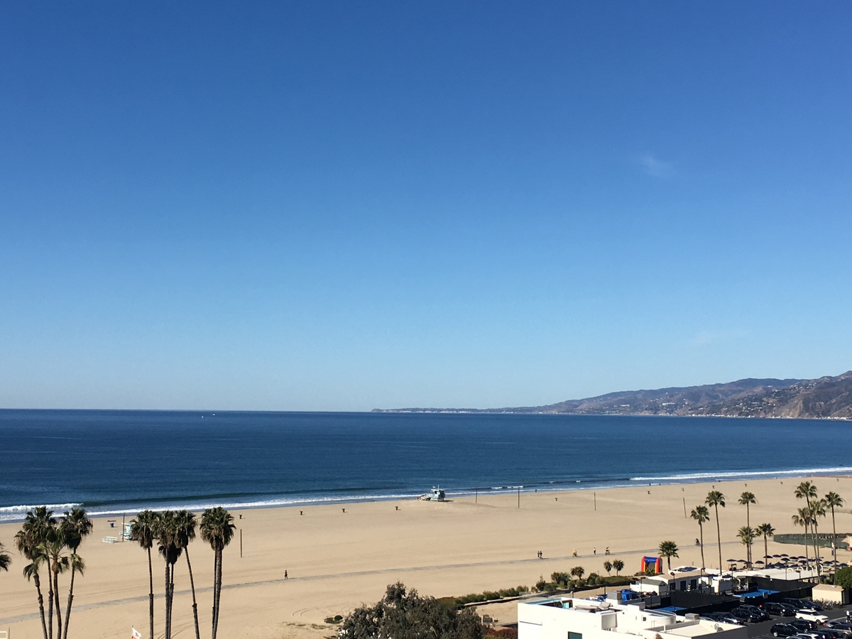 A panoramic view across Santa Monica Beach and the Pacific Ocean