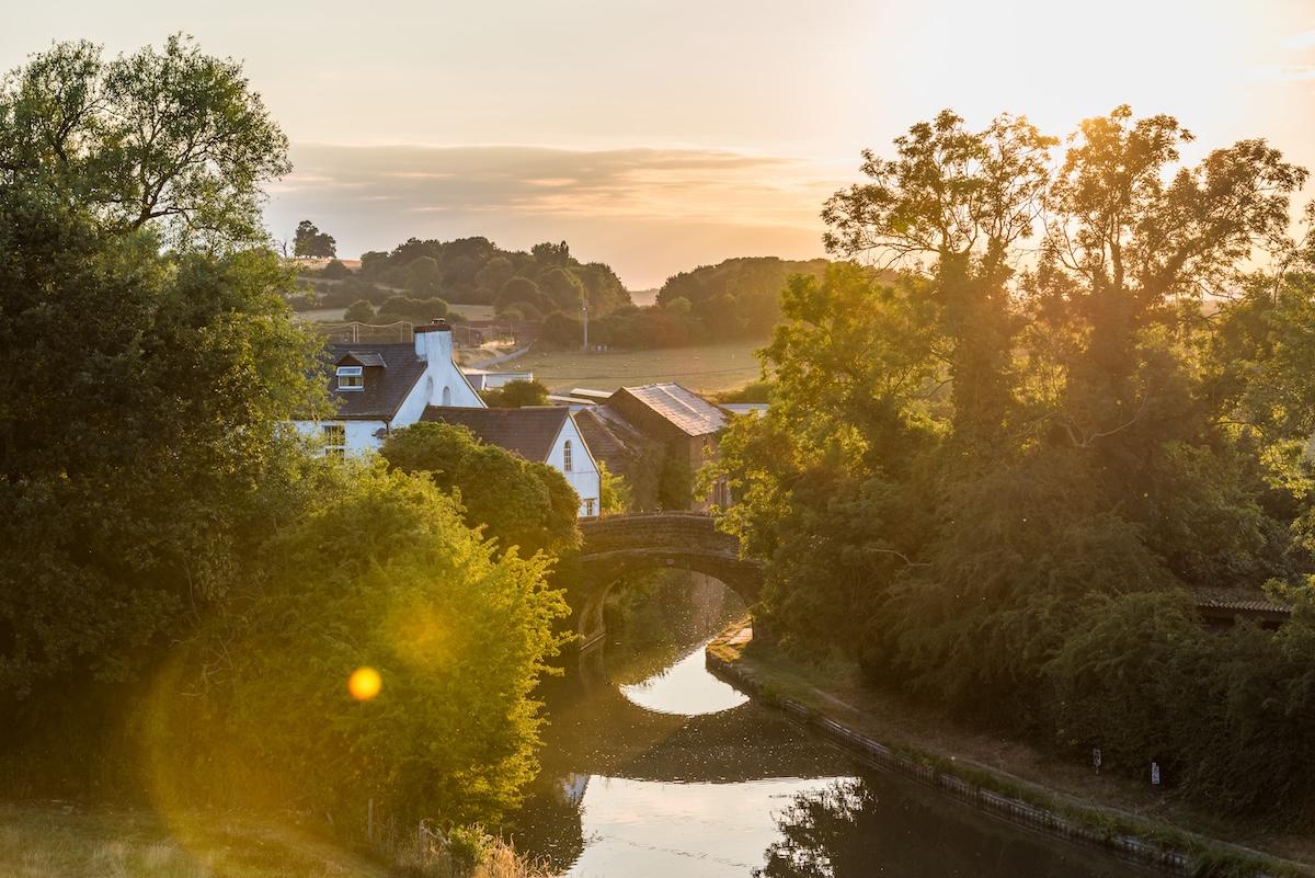 English countryside river and bridge at dusk